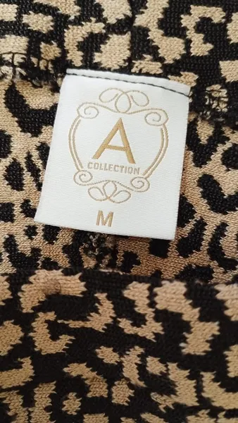 Saia de lã tricotada animal print  nova tamanho M