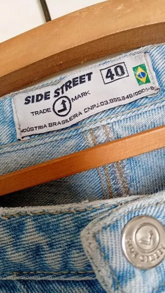 Calça jeans feminina flare bordada retrô cintura baixa