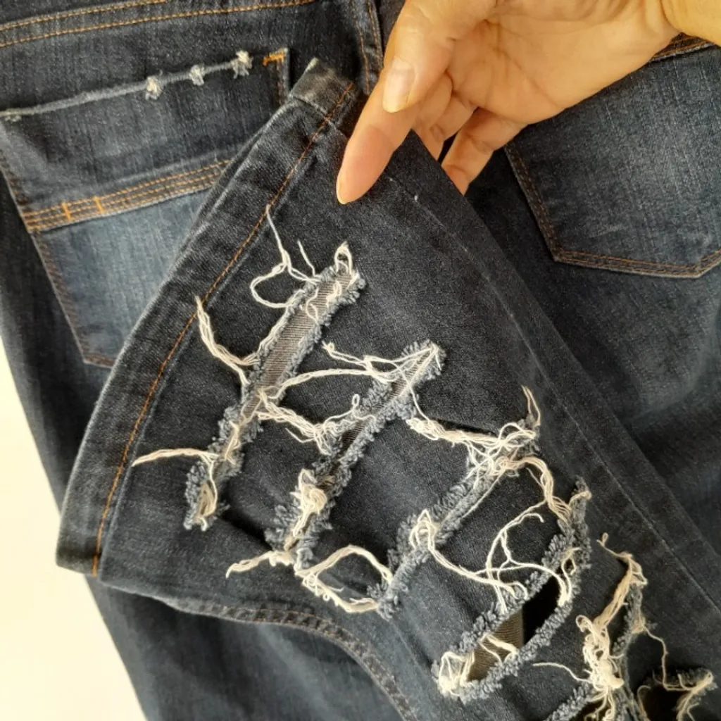 *RASGADO* calça jeans flare cint. média destroyed iódice c&a 36