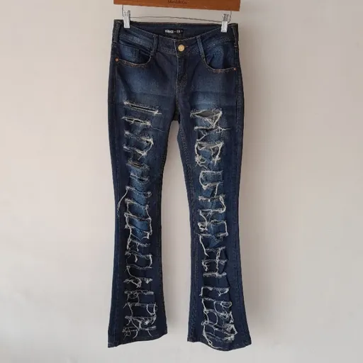*RASGADO* calça jeans flare cint. média destroyed iódice c&a 36