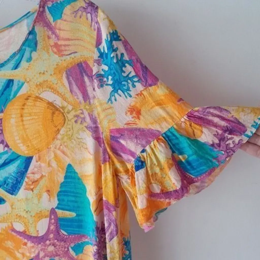 *ESTAMPA VIBRANTE* blusa manga curta flare estampada