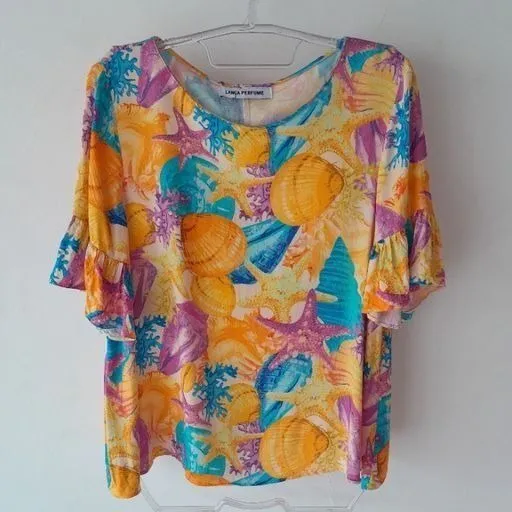 *ESTAMPA VIBRANTE* blusa manga curta flare estampada