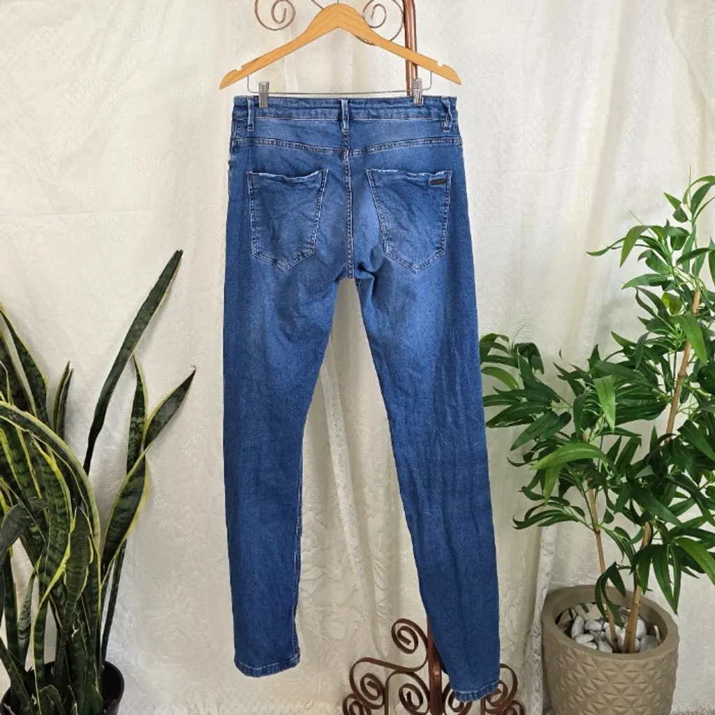 Calça jeans John John