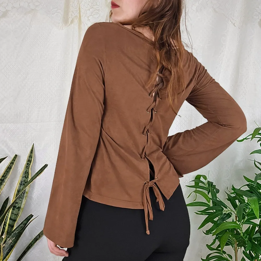 Blusa suede flare