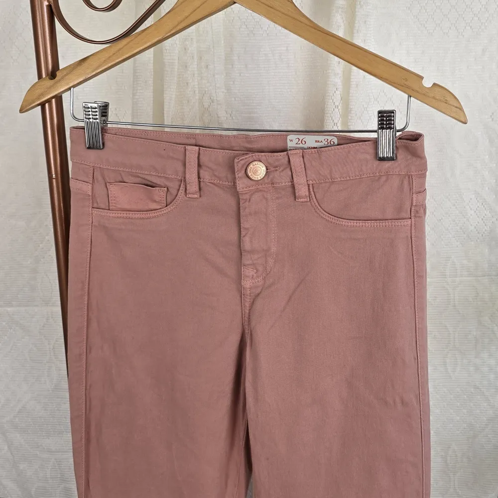 Calça flare Carmim