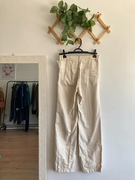 calça bege wideleg