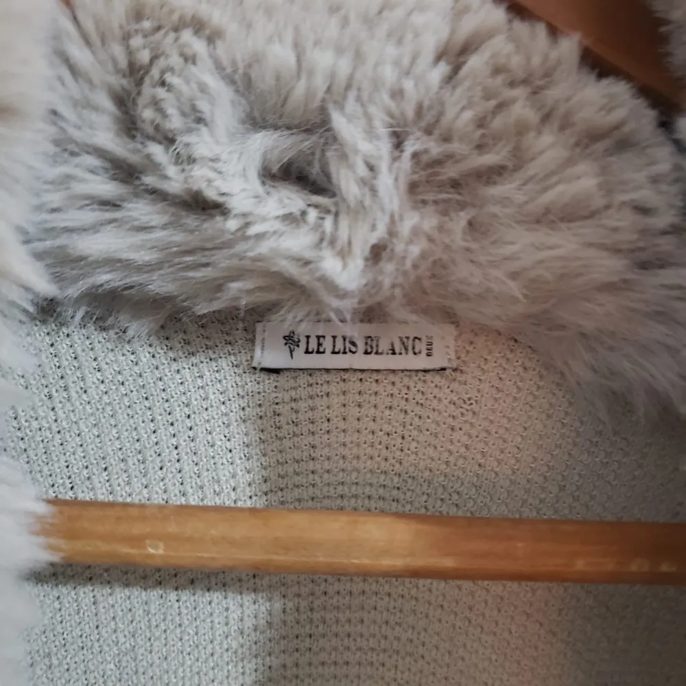 poncho le lis blanc novo