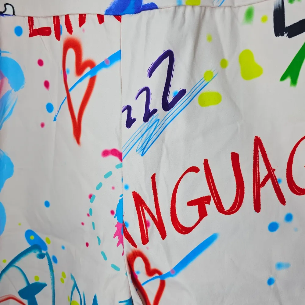 Macacão Jardineira Estampada Grafite GG Shein