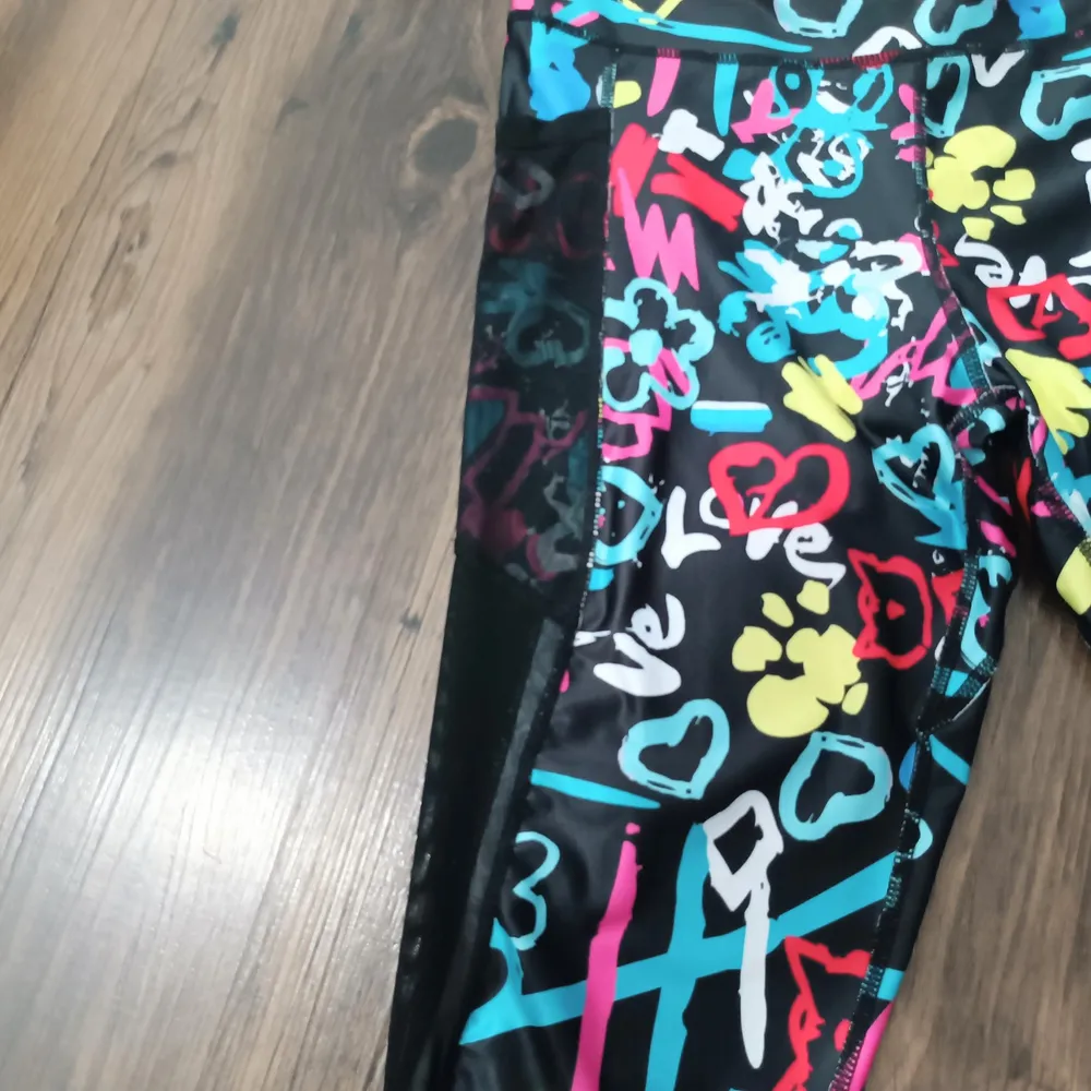 Calça Legging com Bolsos