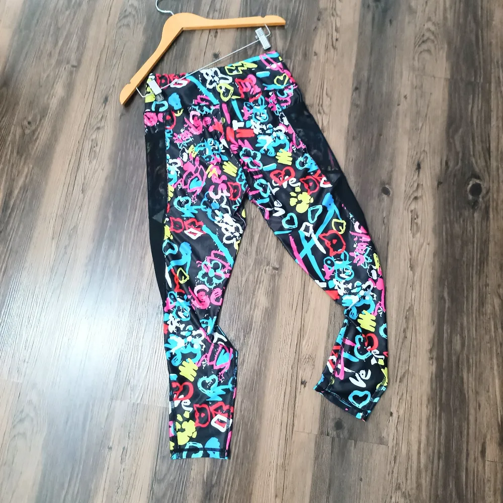 Calça Legging com Bolsos