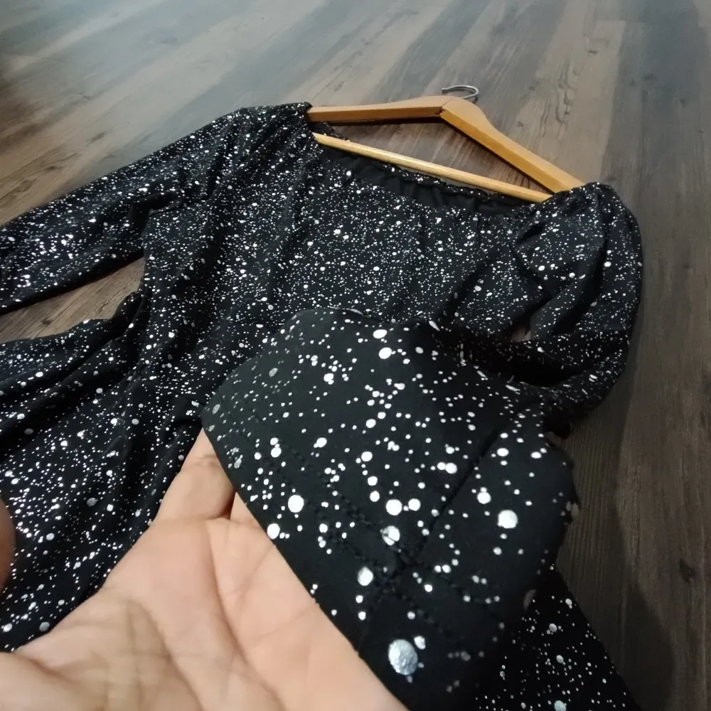 Blusa Peplum Manga Longa Ombro Único