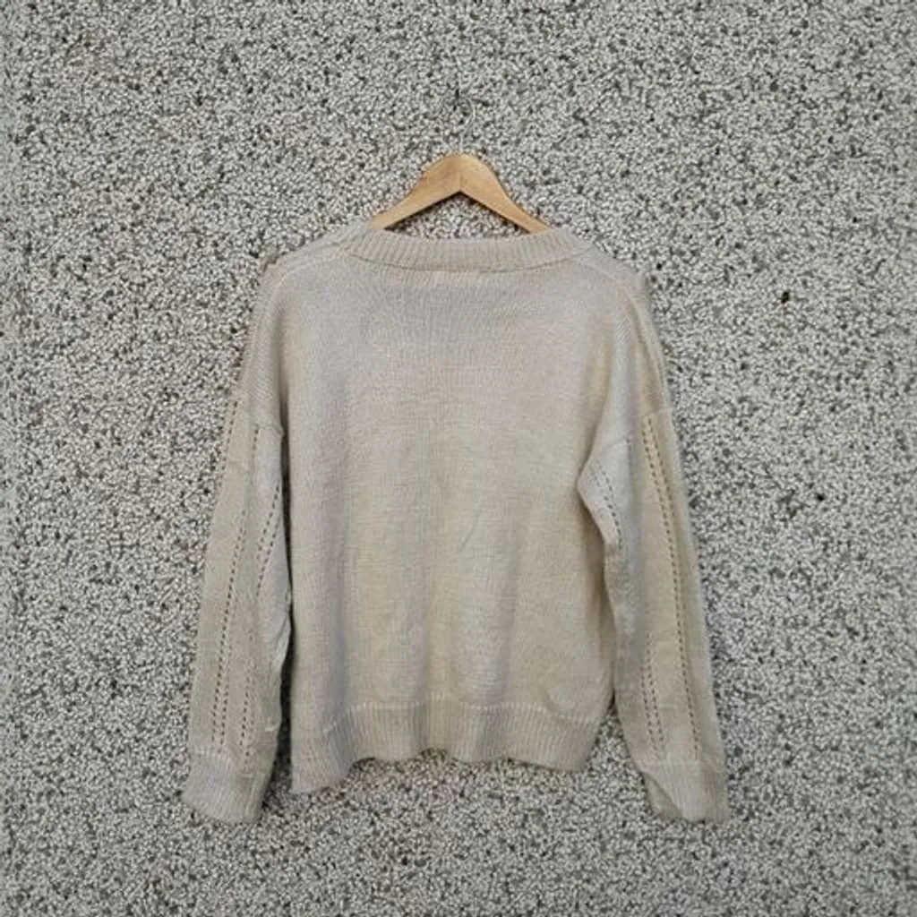 Suéter tricô trançado