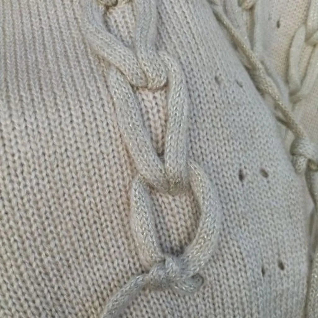 Suéter tricô trançado