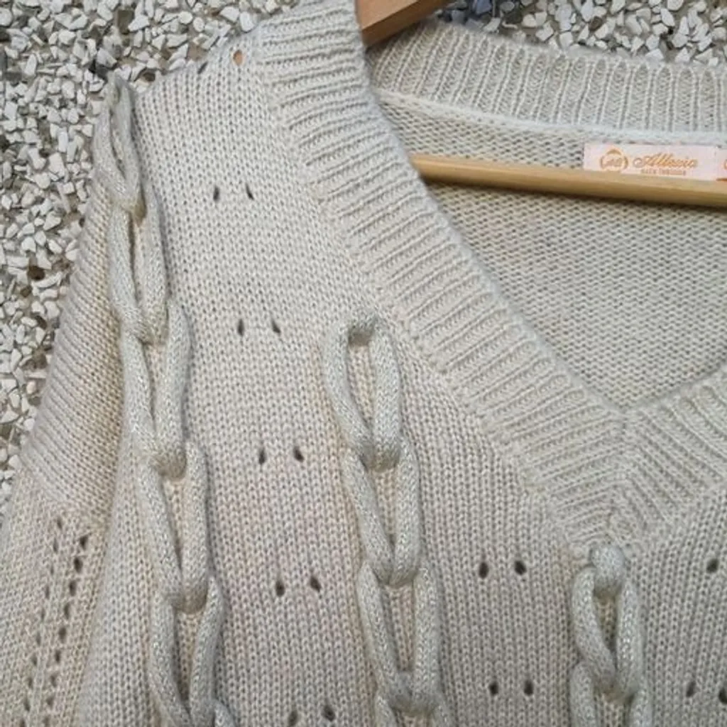 Suéter tricô trançado