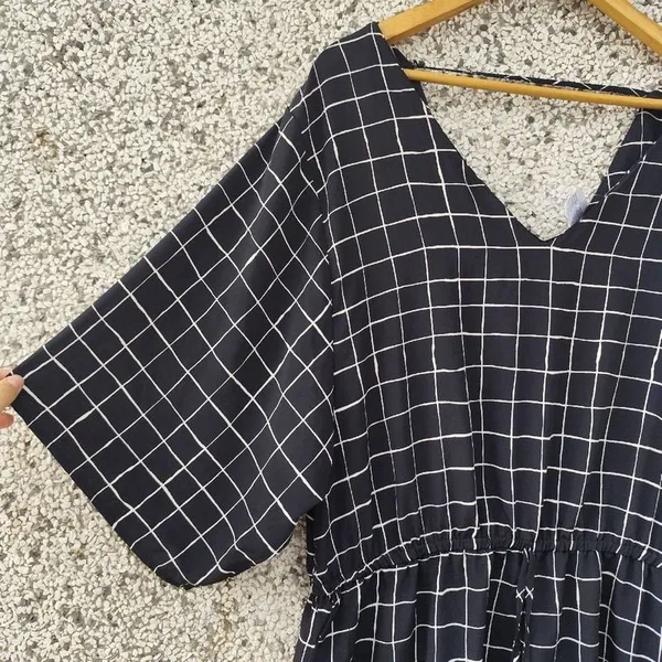 Macaquinho preto plus size