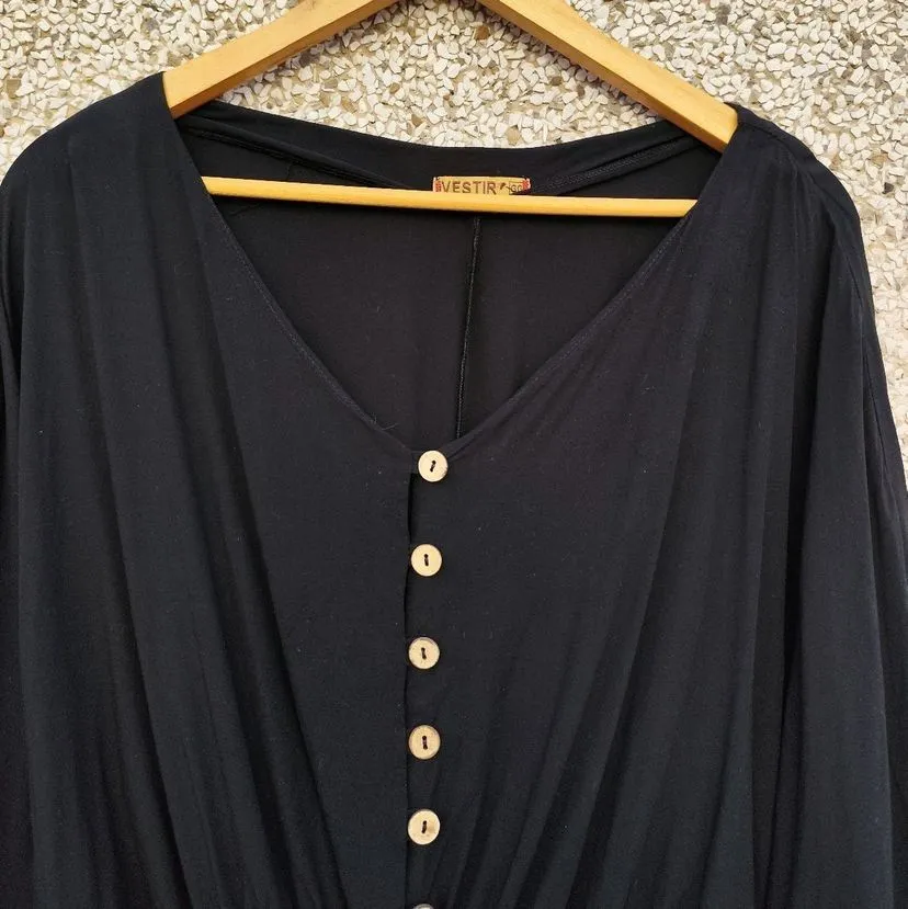 Blusa preta manga morcego