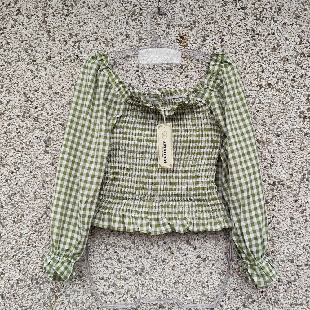 Blusa verde xadrez lastex