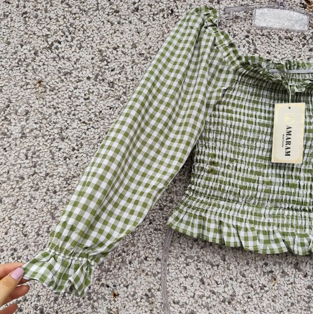 Blusa verde xadrez lastex