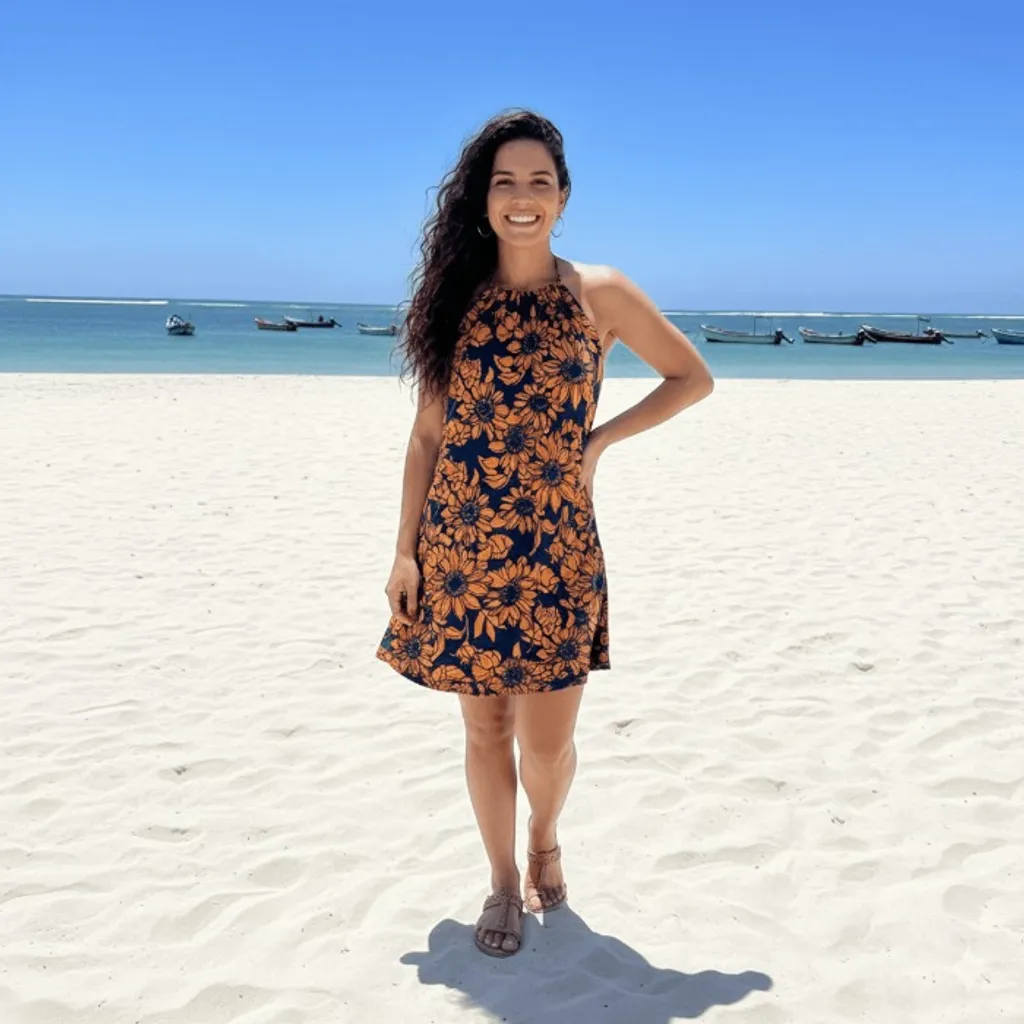 Vestido feminino azul marinho com estampa em laranja, ideal para