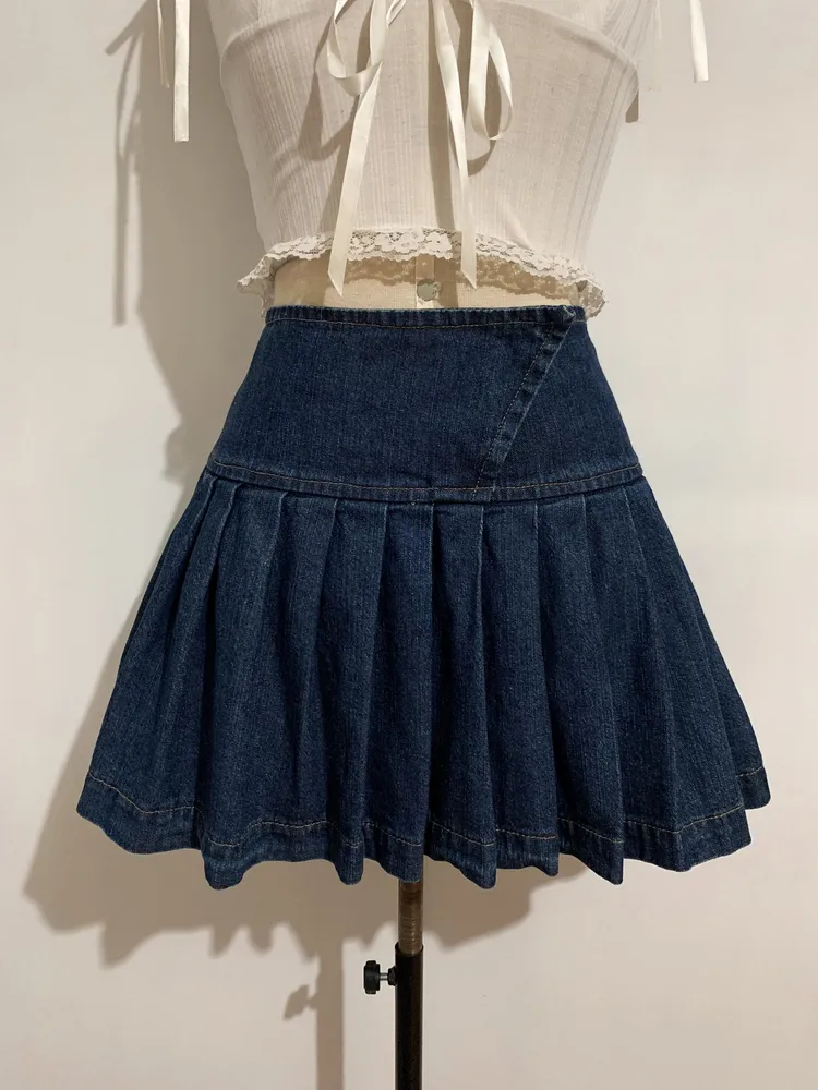 Saia jeans plissada fechamento de botão - Tamanho G