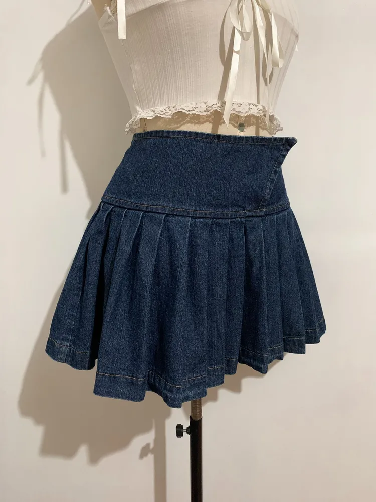 Saia jeans plissada fechamento de botão - Tamanho G