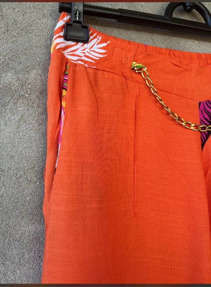 calca pantalona laranja tropical