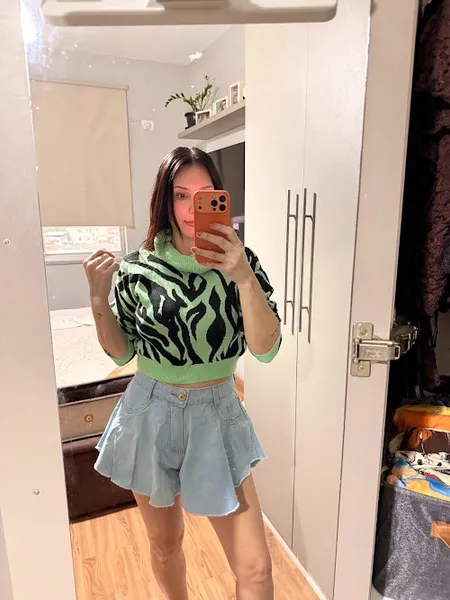 Casaco verde em trico com gola