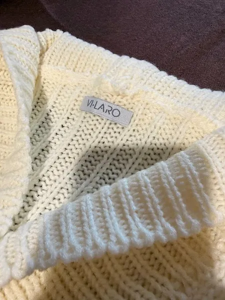Blusa em tricô alongada