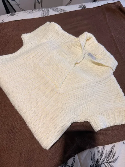 Blusa em tricô alongada