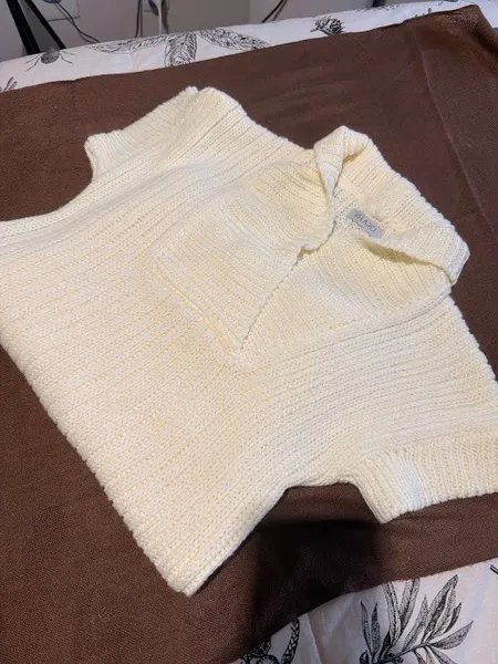 Blusa em tricô alongada