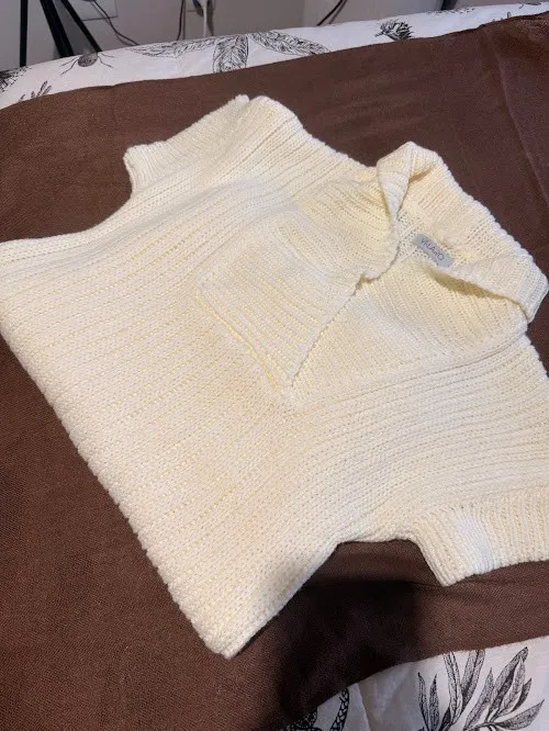Blusa em tricô alongada