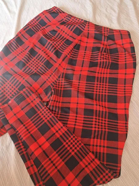 calça xadrez plus size