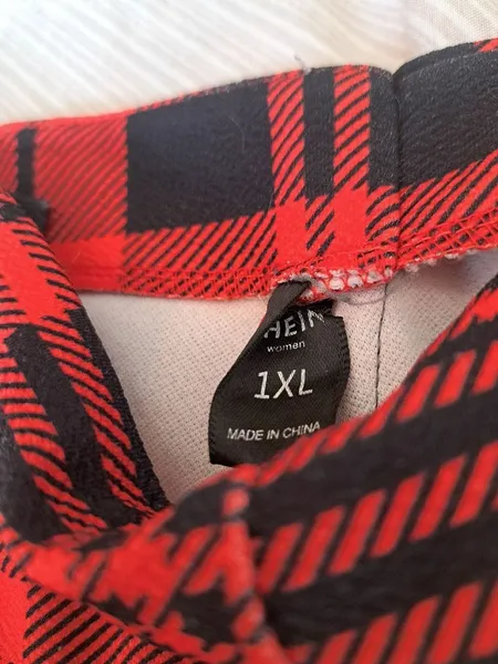 calça xadrez plus size