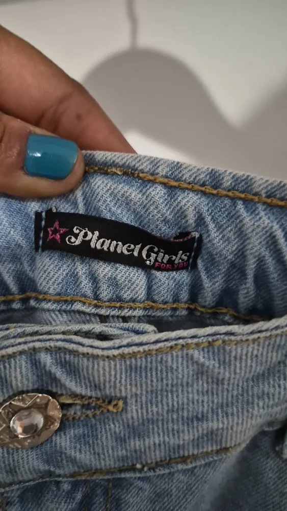 calca jeans estampada de estrela