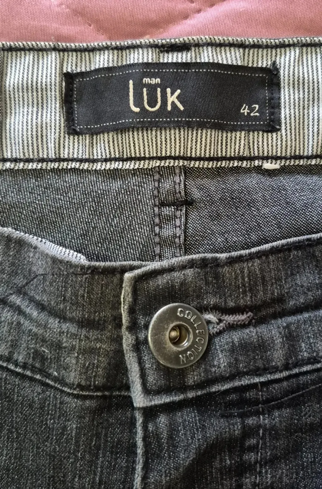 Calça jeans masculina. Marca Man Luk. Tam 42