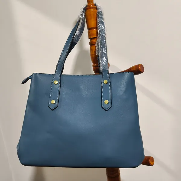 bolsa nova pavão de ouro
