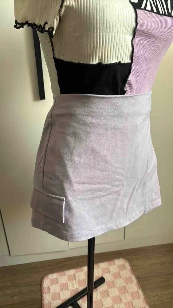 Shorts Saia Lilás 38