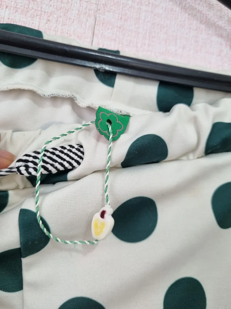 Calça Jogger de poa branca e verde Farm