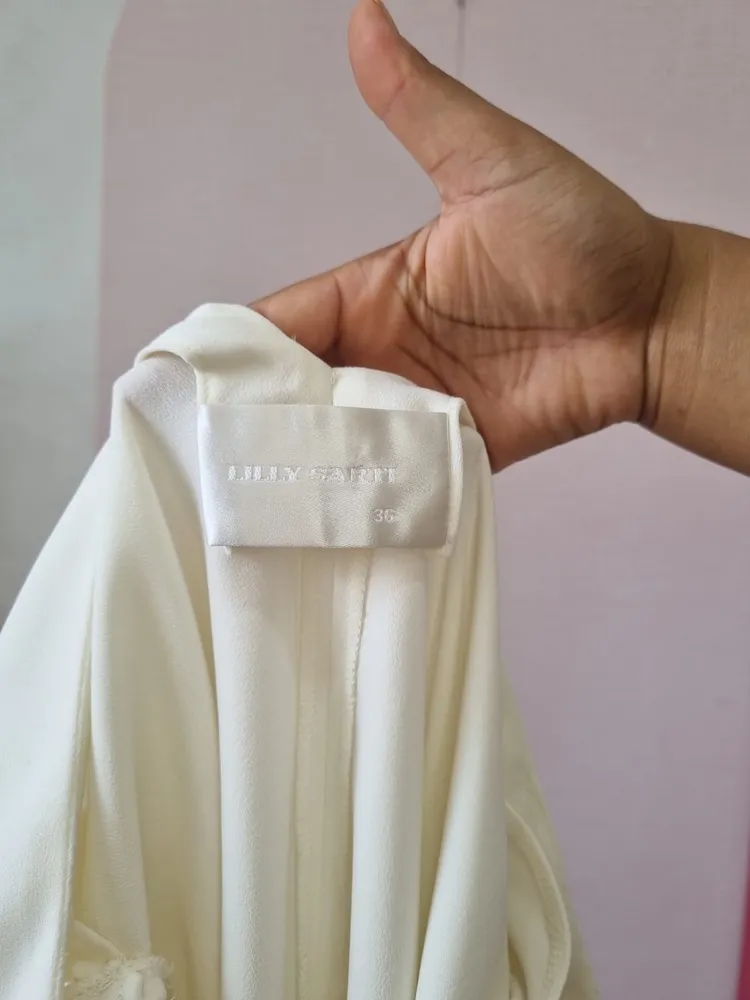 BLUSA DE MANGAS AMPLAS E RECORTES LILLY SARTI