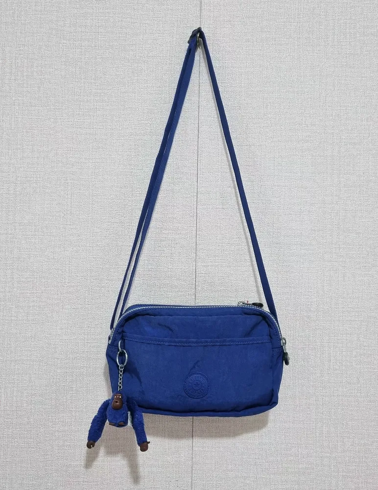 bolsa kipling transversal azul
