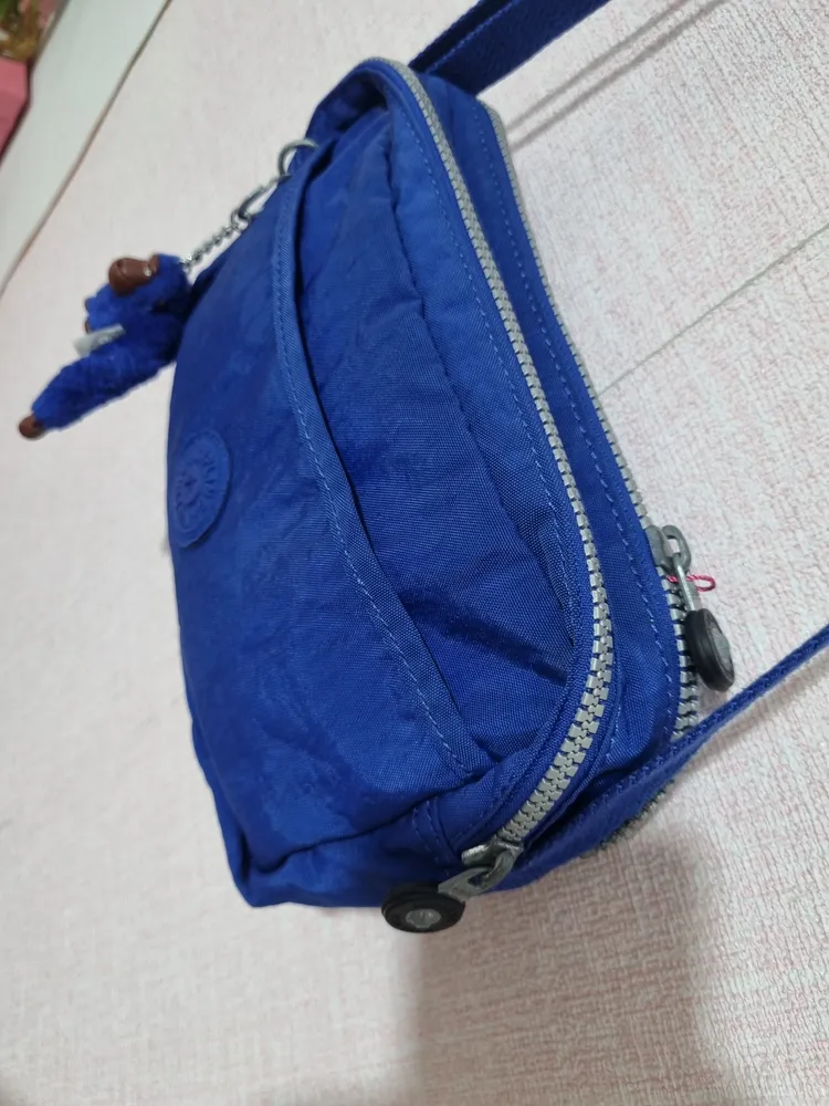 bolsa kipling transversal azul