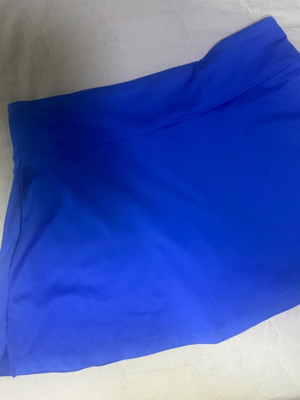 short saia nike azul