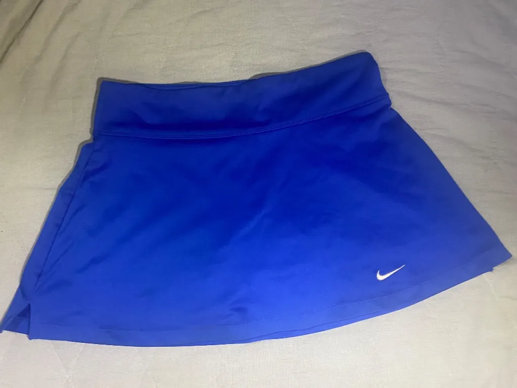 short saia nike azul