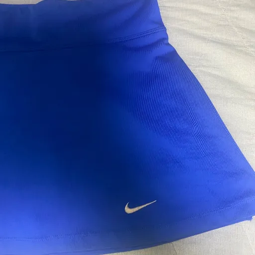 short saia nike azul