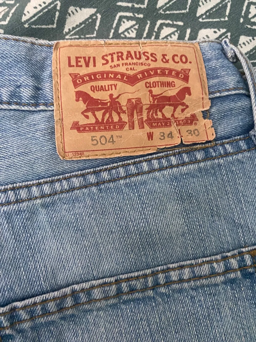 calca levis masculina 44