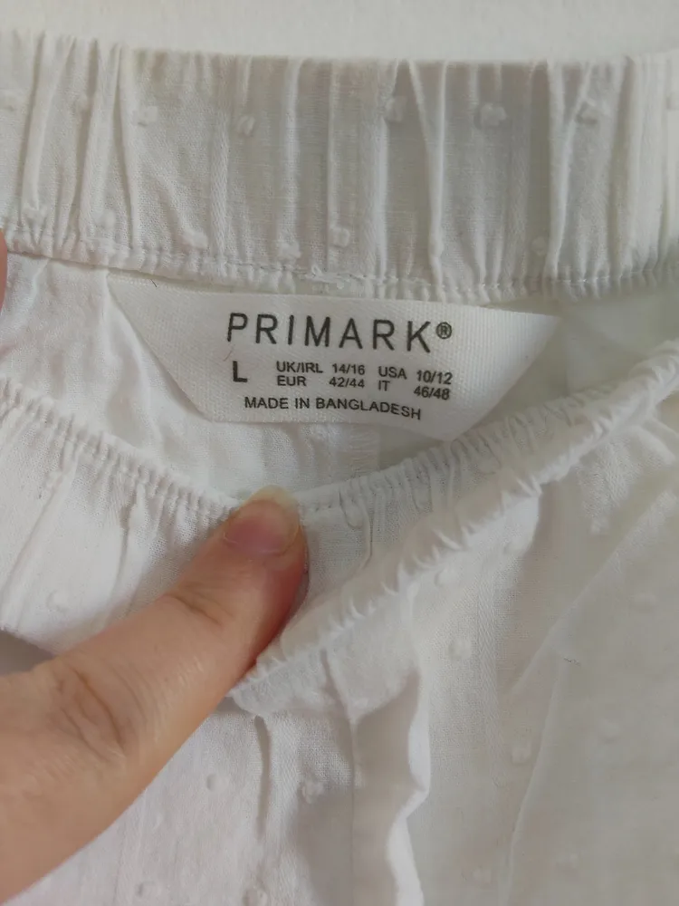 shorts branco poá