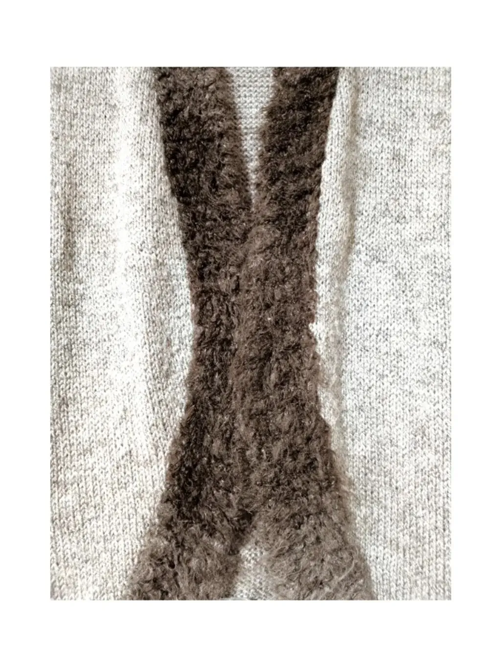 Colete de lã alongado com detalhe em pelúcia