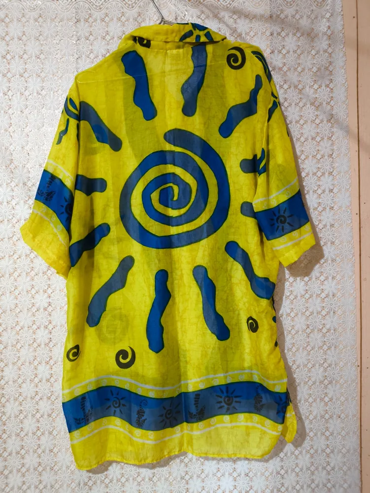 Camisa amarela estampada áfrica