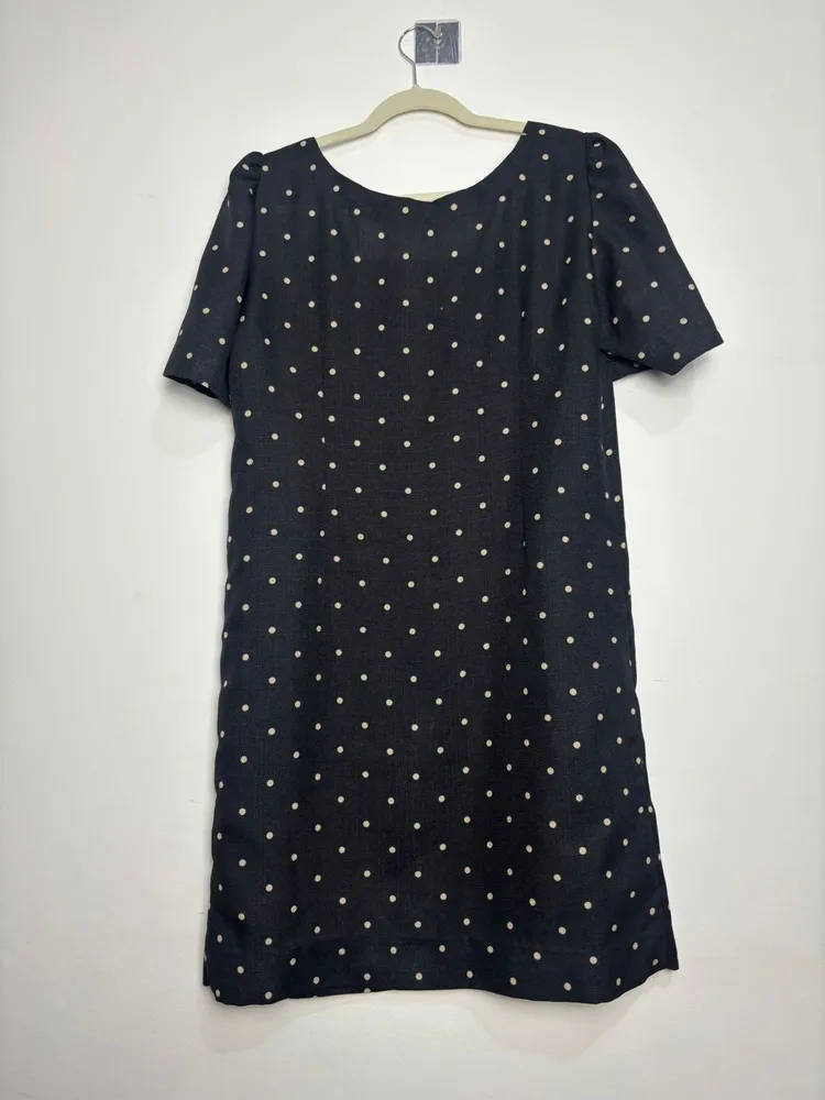 vestido preto de poa