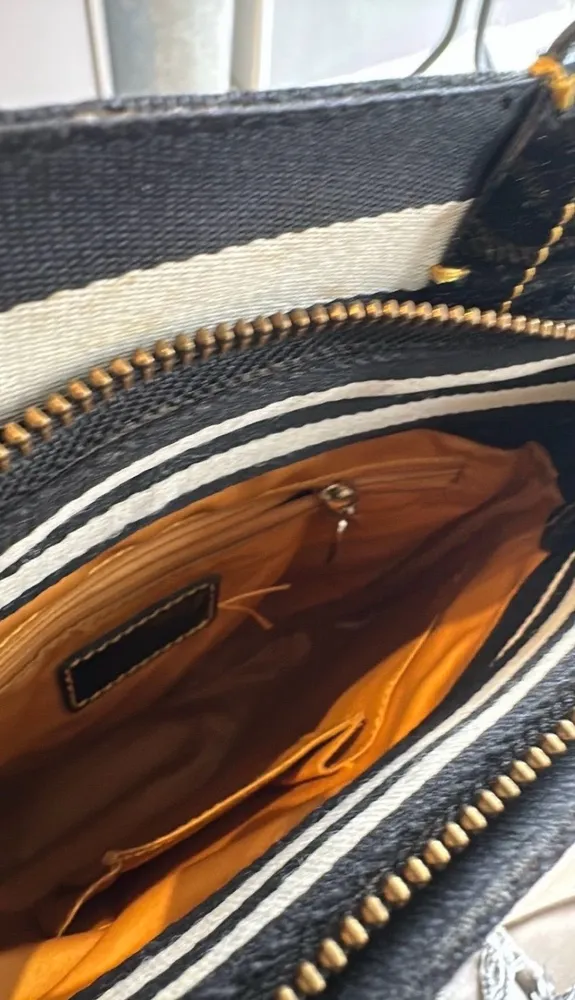 bolsa mochila momograma victor Hugo